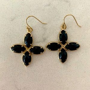 Kendra Scott black stone and gold drop earrings.